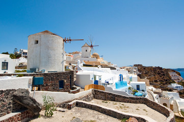 Oia windmills on the island of Santorini. Cyclades in Greece.