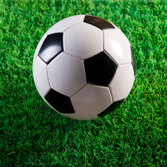 Fototapeta na wymiar Soccer ball on artificial turf