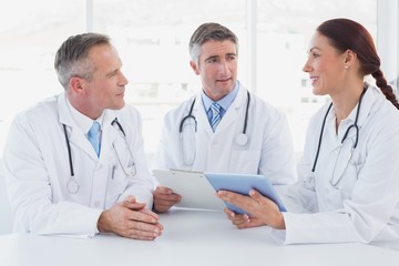 Fototapeta premium Doctors using a tablet together