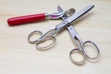 scissors on wood background