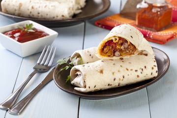 burritos wraps with meat beans and vegetables