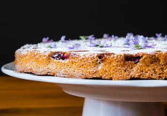 Cake with red fruits.Rustic cake with grapes
