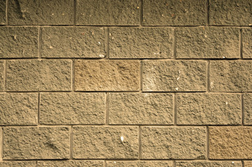 Fototapeta premium The wall of the large rectangular stones as background tinted se