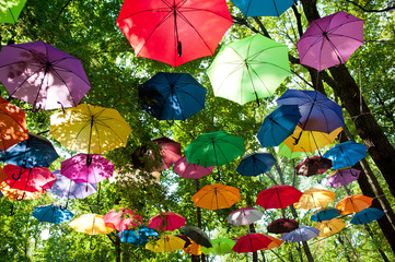 Fototapeta na wymiar a lot of varicoloured umbrellas