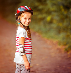 little girl on roller skates