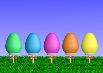 Colorful Easter Eggs on Sticks in Grass