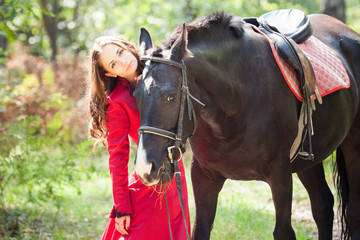 Obraz premium brunette girl and horse