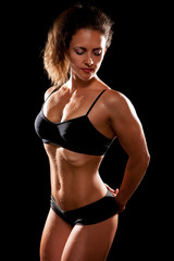Fototapeta na wymiar Sporty muscular woman