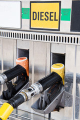 Close up of gas pump nozzles