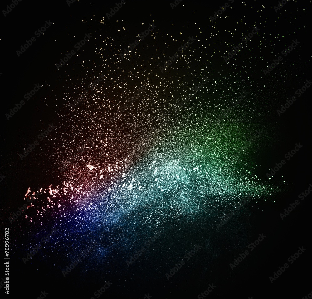 Canvas Prints colourful powder exploding isolated on black