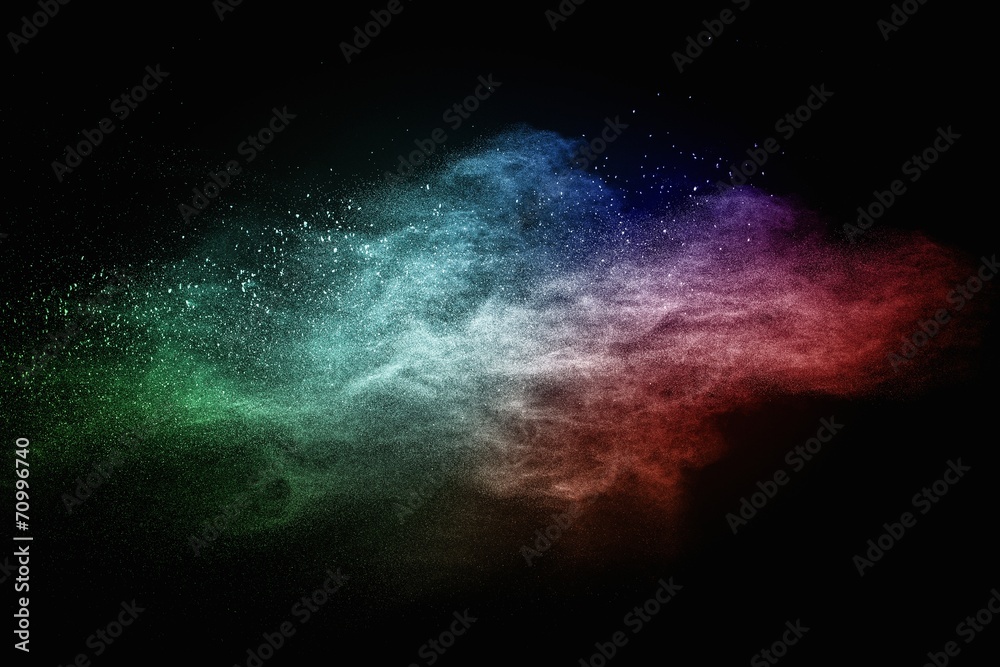 Canvas Prints colourful powder exploding isolated on black
