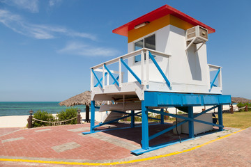 Colorful lifeguard tower on the beach in sunny day
