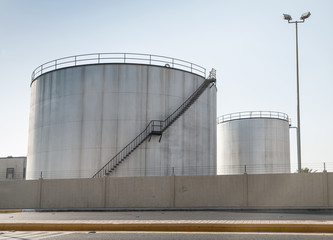 Metal gray tanks near the highway in Saudi Arabia