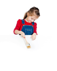 little girl with a brush and white banner