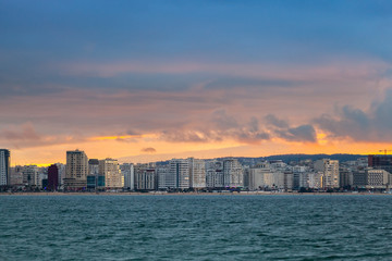 Obraz premium Bright sunset sky above new region of Tangier, Morocco