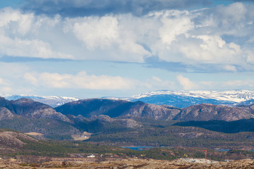 Fototapeta premium Empty Norwegian mountain landscape background with cloudy sky