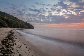 Baltic sea at beautiful sunrise in Poland beach. Orlowo Gdynia 