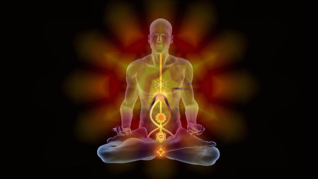 Man in yoga meditation pose with chackra symbols
