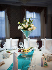 Table decor with flowers table numbers and candles