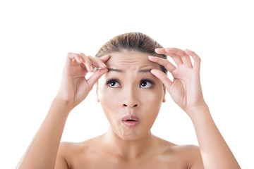 Fototapeta premium Asian beauty look at her wrinkle