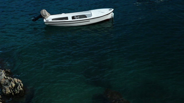 Fishing boat afloat in the Mediterranean Sea. Croatia shore.