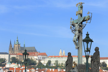 Prague gothic Castle from Charles Bridge with its Statues