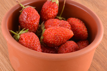 Fresh strawberries on wood table
