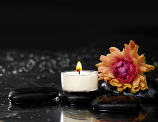 Obraz na płótnie Canvas Still life with ranunculus flower with white candle