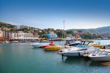 Fototapeta na wymiar Yachts and pleasure boats are moored in marina of Balchik