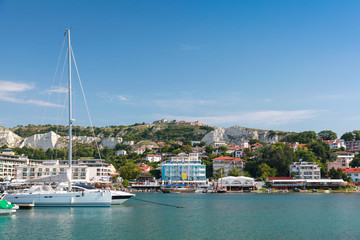 Yachts and pleasure boats are moored in marina of Balchik town