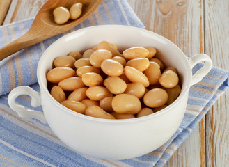 White beans on  wooden background