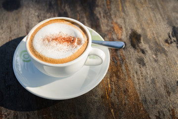 Coffee cup on wooden table