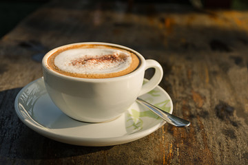 Coffee cup on wooden table
