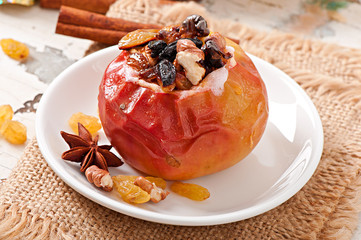 Baked apples with raisins, nuts and honey