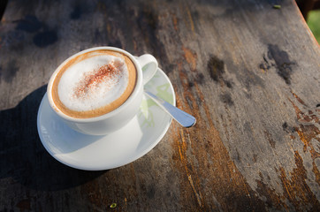 Coffee cup on wooden table