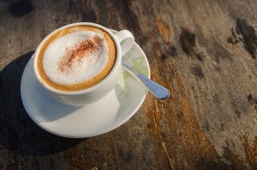 Coffee cup on wooden table