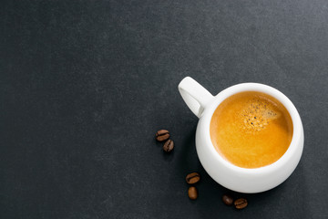 cup of espresso on a dark background and space for your text