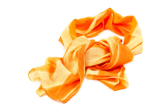 Orange scarf with tassels on white background.
