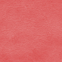 Fototapeta premium red worn leather texture closeup. Useful as background