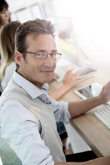 Attractive 40-year-old man in business training