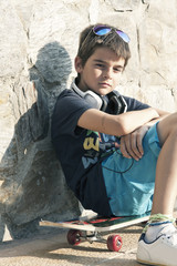 boy with skateboard street fashion, youth and lifestyle © carballo