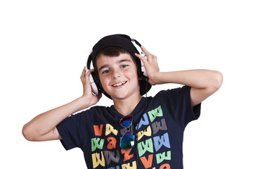 child with current clothing with headphones listening to music