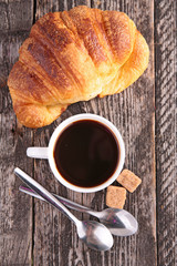 coffee cup and croissant