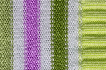 Knit woolen texture. Fabric striped background
