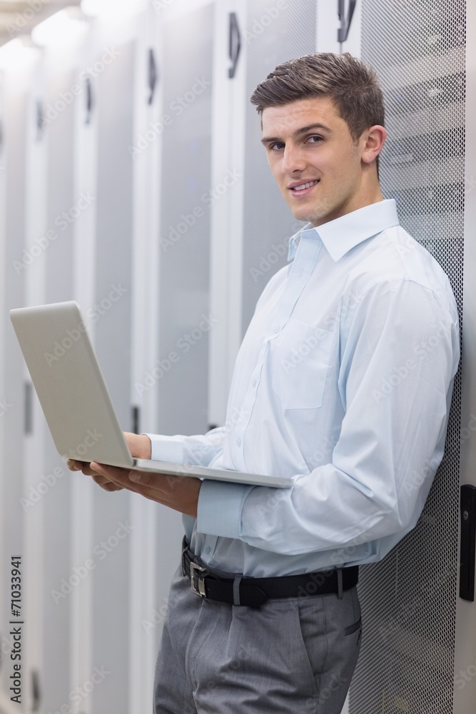 Aufkleber Smiling technician using his notebook