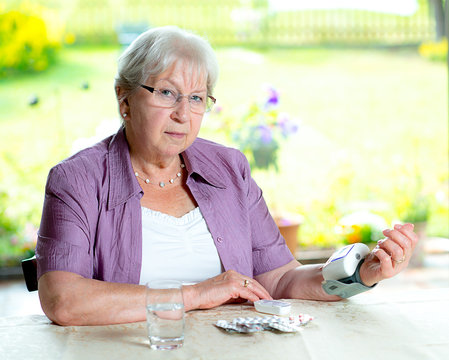 Older Woman Is Measuring Blood Pressure