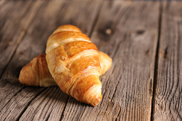 Croissants on a wooden table