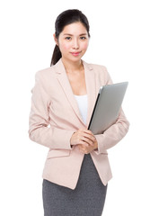 Businesswoman hold laptop