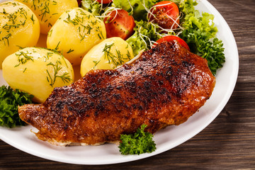 Roast duck fillet and vegetables