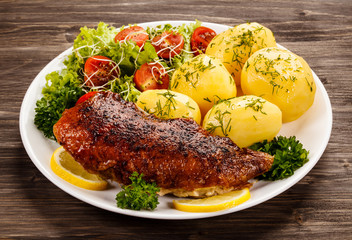 Roast duck fillet and vegetables
